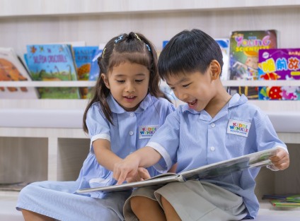 kiddiwinkie schoolhouse children reading a book